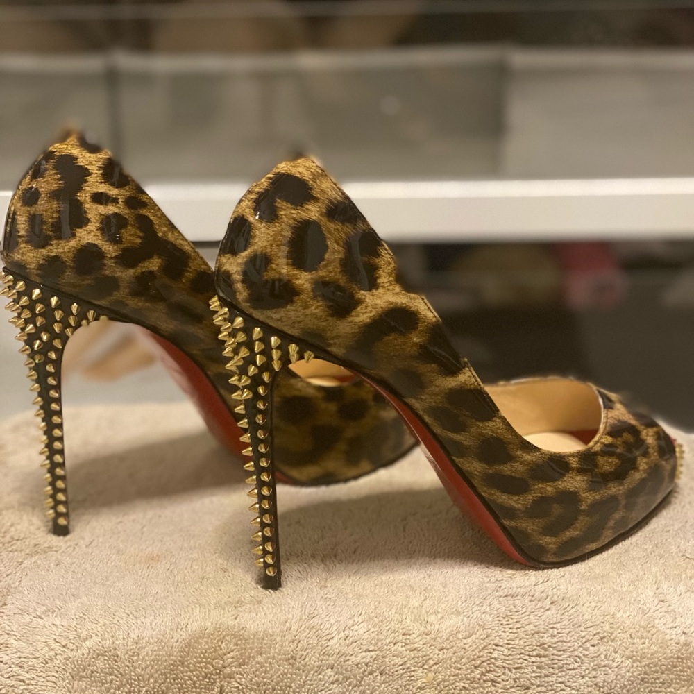 Christian Louboutin, European size 37, animal print heels with gold spikes